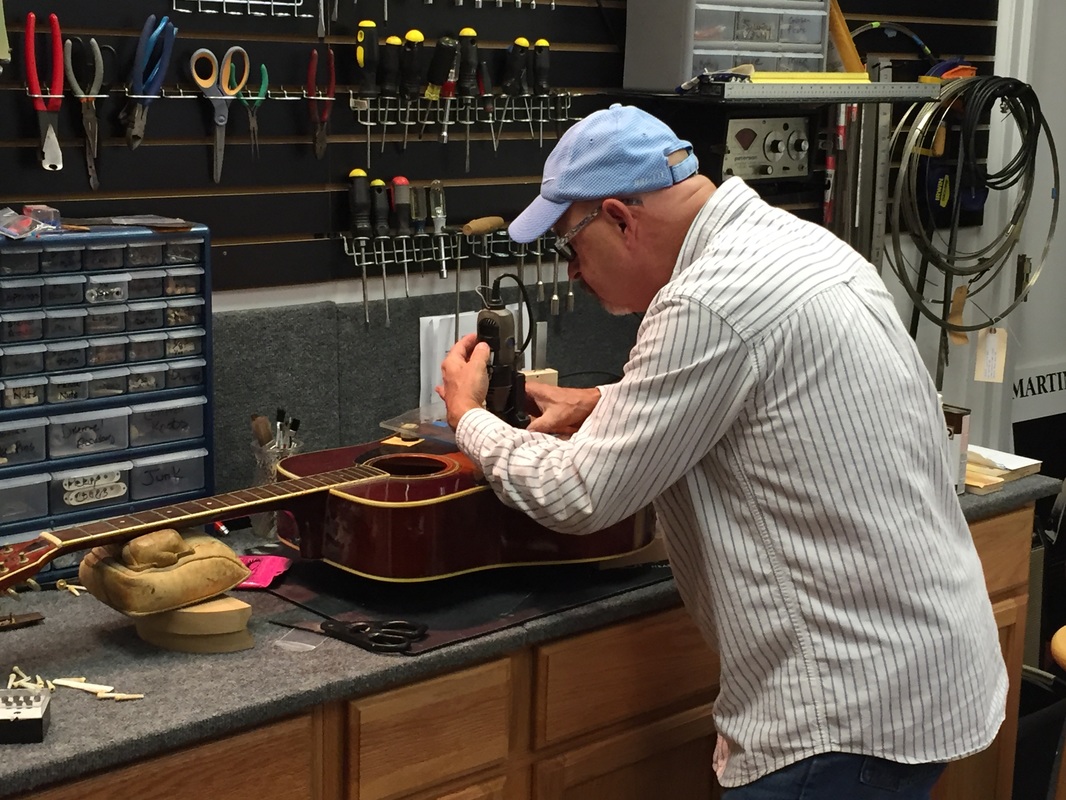 Repair shop guitar deals